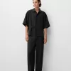 Kortärmad boxy fit korsad skjorta med spänne Kortärmad boxy fit korsad skjorta med spänne