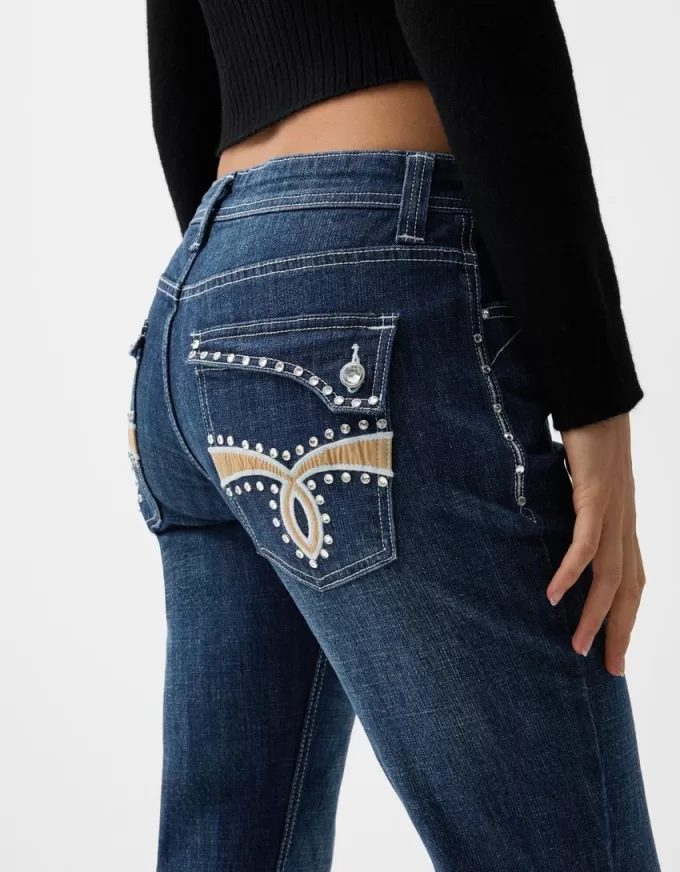 Lågt känga jeans med broderi