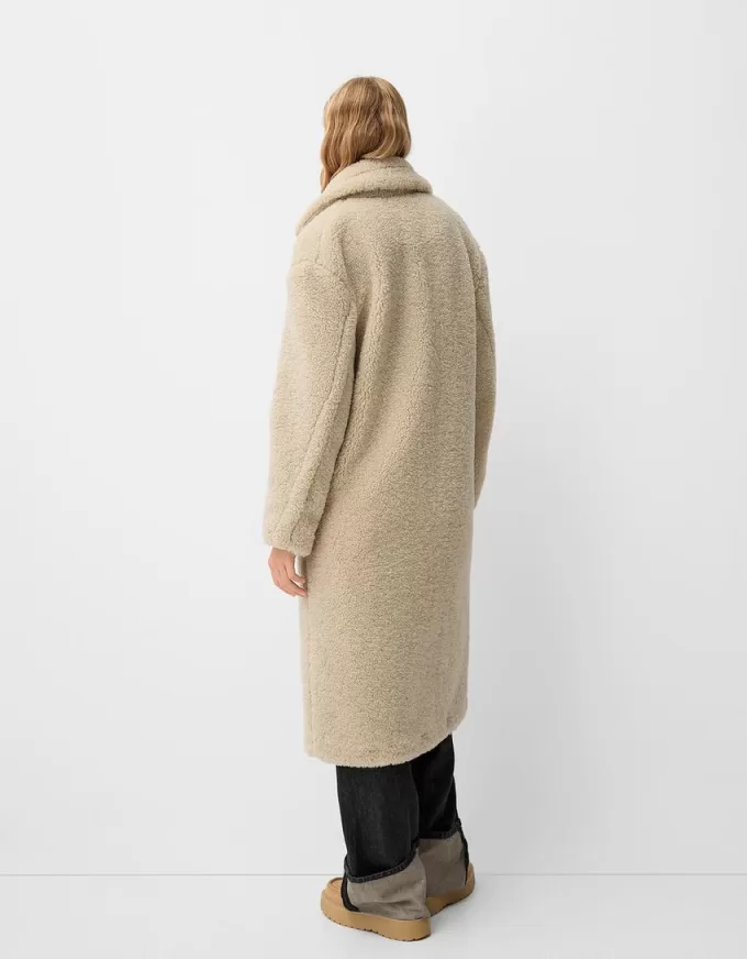 Lång faux shearling-rock