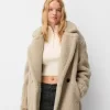 Lång faux shearling-rock