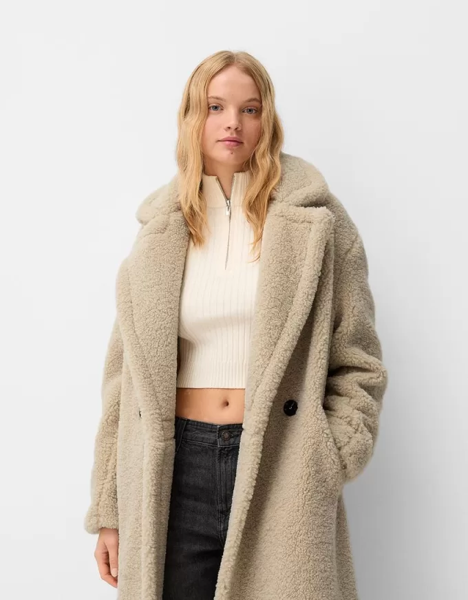 Lång faux shearling-rock