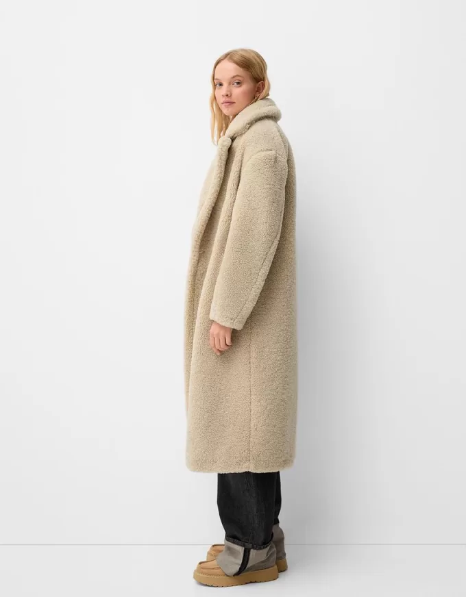 Lång faux shearling-rock