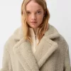 Lång faux shearling-rock