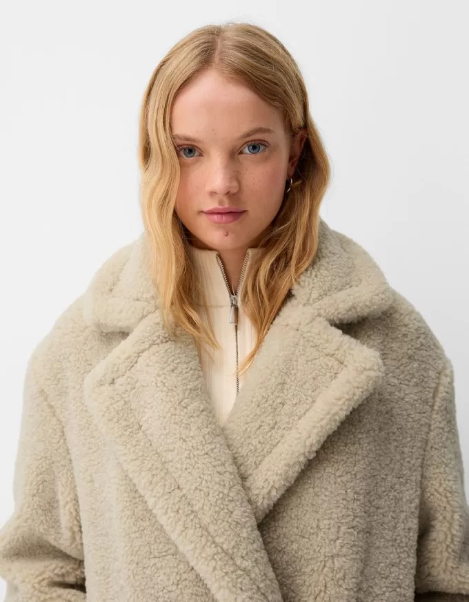 Lång faux shearling-rock