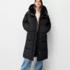 Lång pufferrock med huva