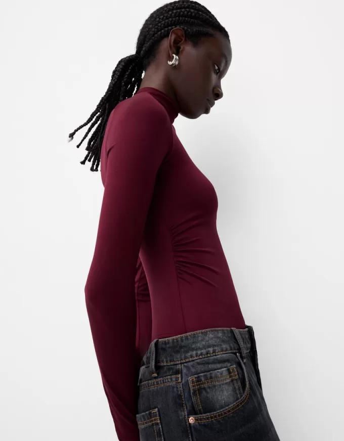 Långärmad body med hög hals Långärmad body med hög hals