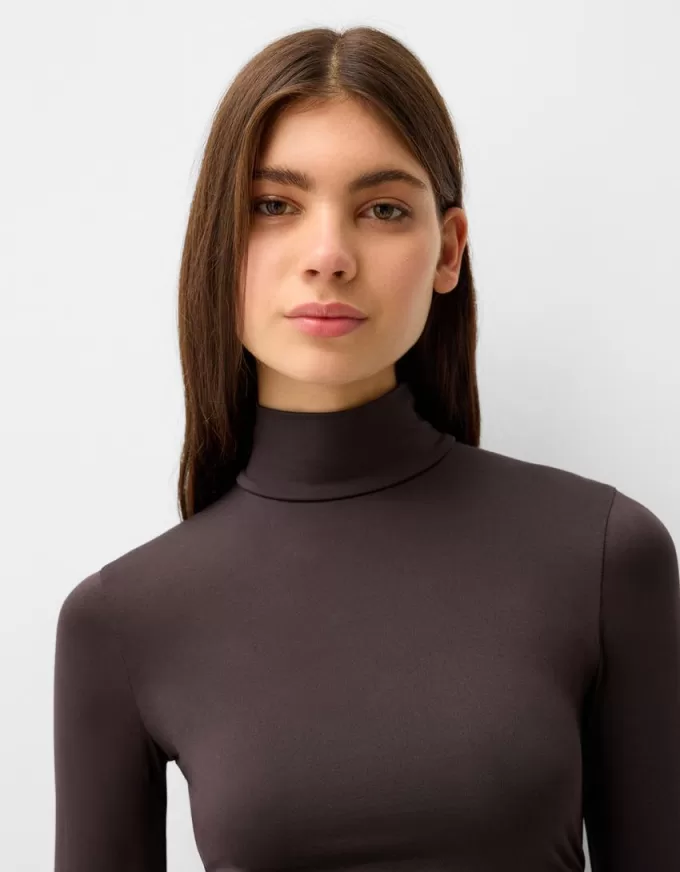 Långärmad body med hög hals Långärmad body med hög hals