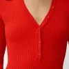 Långärmad bodysuit med utskuren polokrage Långärmad bodysuit med utskuren polokrage