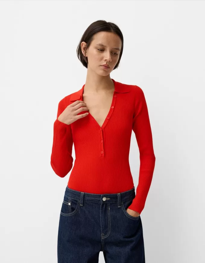 Långärmad bodysuit med utskuren polokrage Långärmad bodysuit med utskuren polokrage