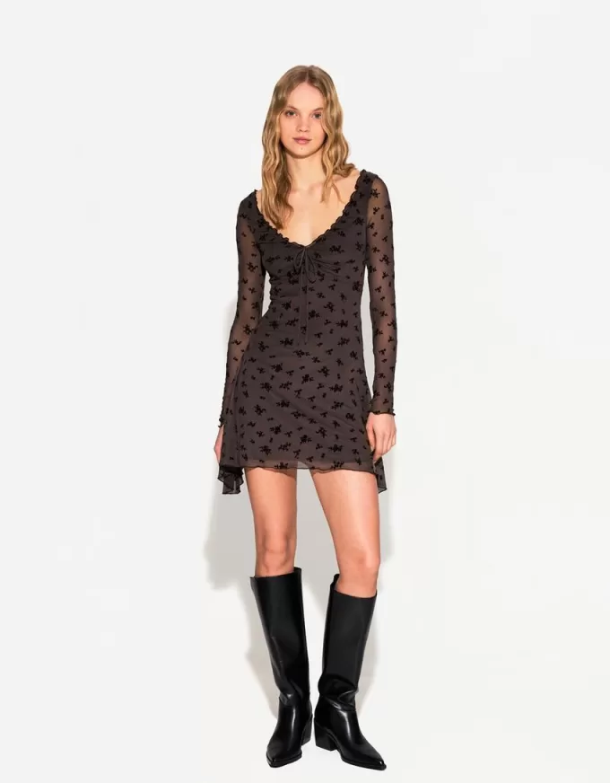 Långärmad miniklänning med tryck Långärmad miniklänning med tryck