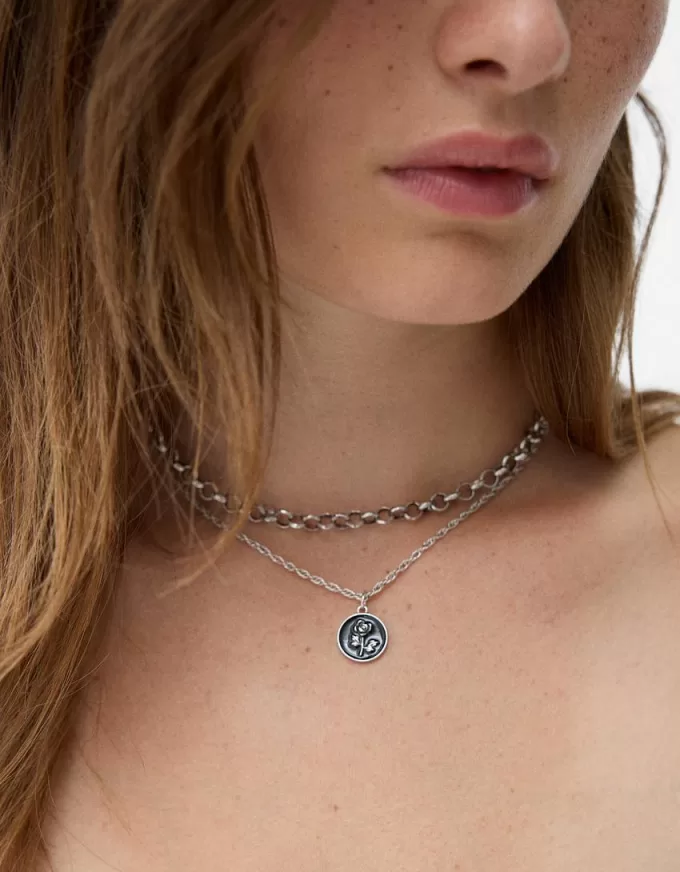 Paket med 4 korshalsband Paket med 4 korshalsband