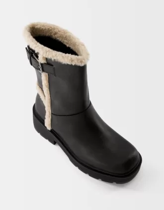 Platta ankelboots med falska shearlingdetalj