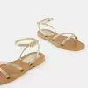 Platta sandaler i metall med rem Platta sandaler i metall med rem