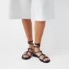 Platta sandaler med ringdetaljer Platta sandaler med ringdetaljer
