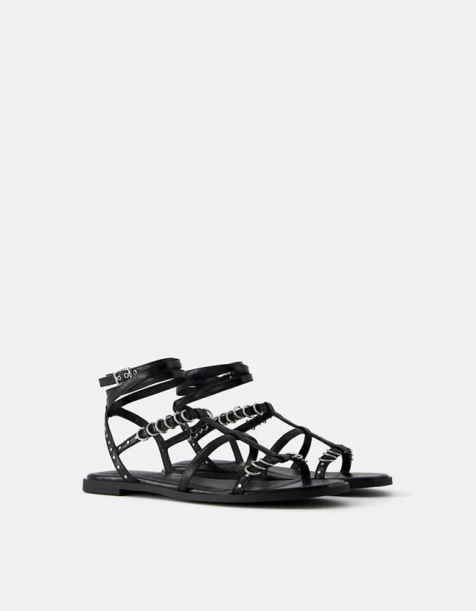 Platta sandaler med ringdetaljer Platta sandaler med ringdetaljer