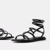 Platta sandaler med ringdetaljer Platta sandaler med ringdetaljer