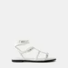 Platta sandaler med ringdetaljer Platta sandaler med ringdetaljer
