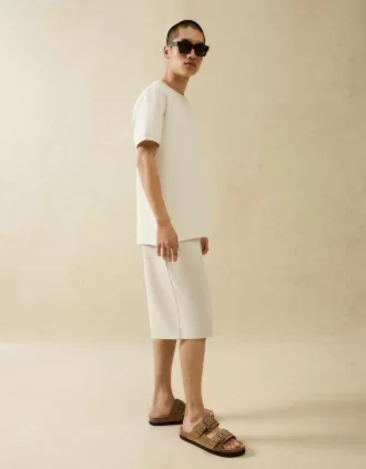 Platta sandaler med spännade läder