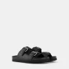 Platta sandaler med spännade läder Platta sandaler med spännade läder