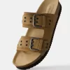Platta sandaler med spännade läder Platta sandaler med spännade läder