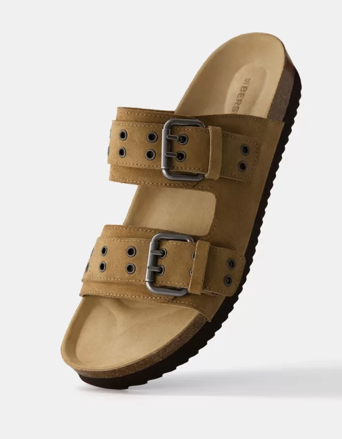 Platta sandaler med spännade läder Platta sandaler med spännade läder