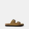Platta sandaler med spännade läder Platta sandaler med spännade läder