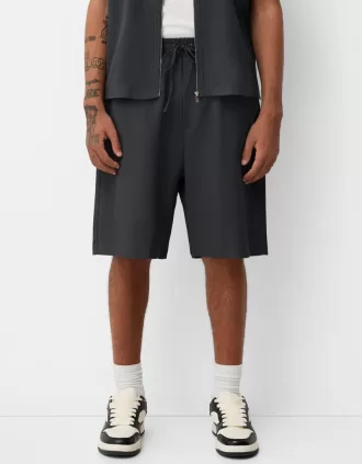 Plisserade Bermuda sweatshorts