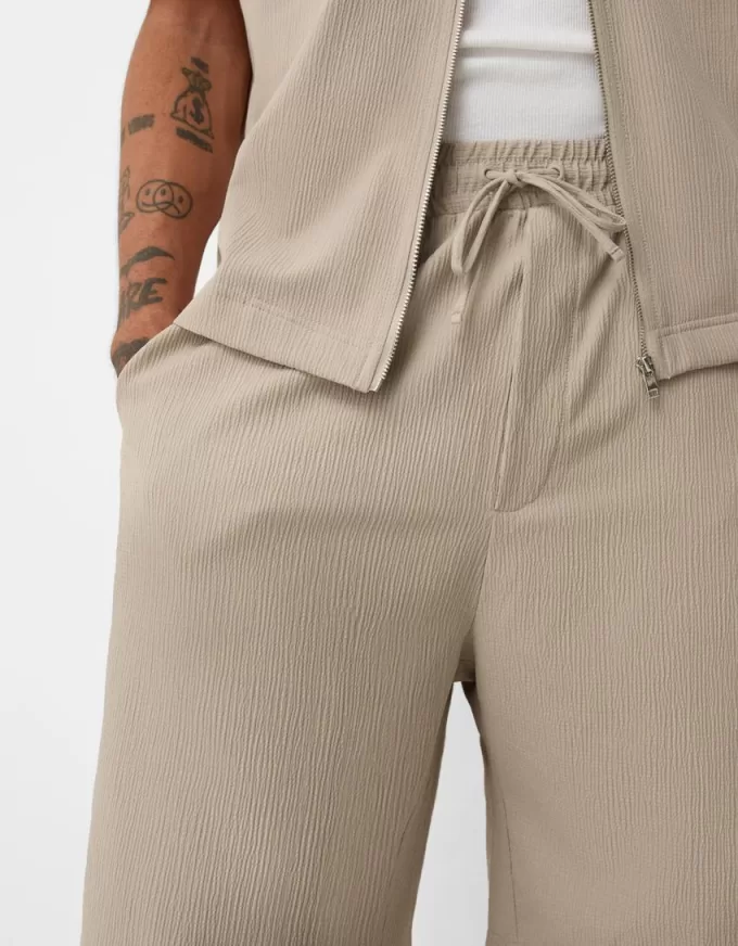 Plisserade Bermuda sweatshorts Plisserade Bermuda sweatshorts