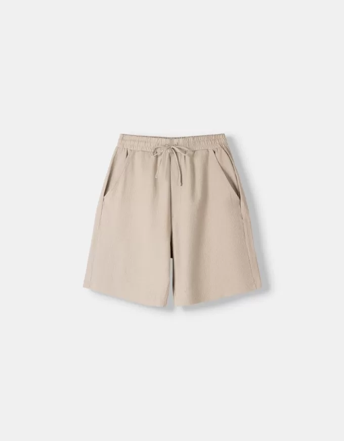 Plisserade Bermuda sweatshorts Plisserade Bermuda sweatshorts