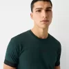 Slim-fit kortärmad T-shirt med randig detalj Slim-fit kortärmad T-shirt med randig detalj