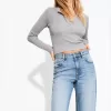Slitna 90-talsjeans med vida ben Slitna 90-talsjeans med vida ben