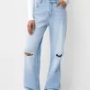 Slitna 90-talsjeans med vida ben Slitna 90-talsjeans med vida ben