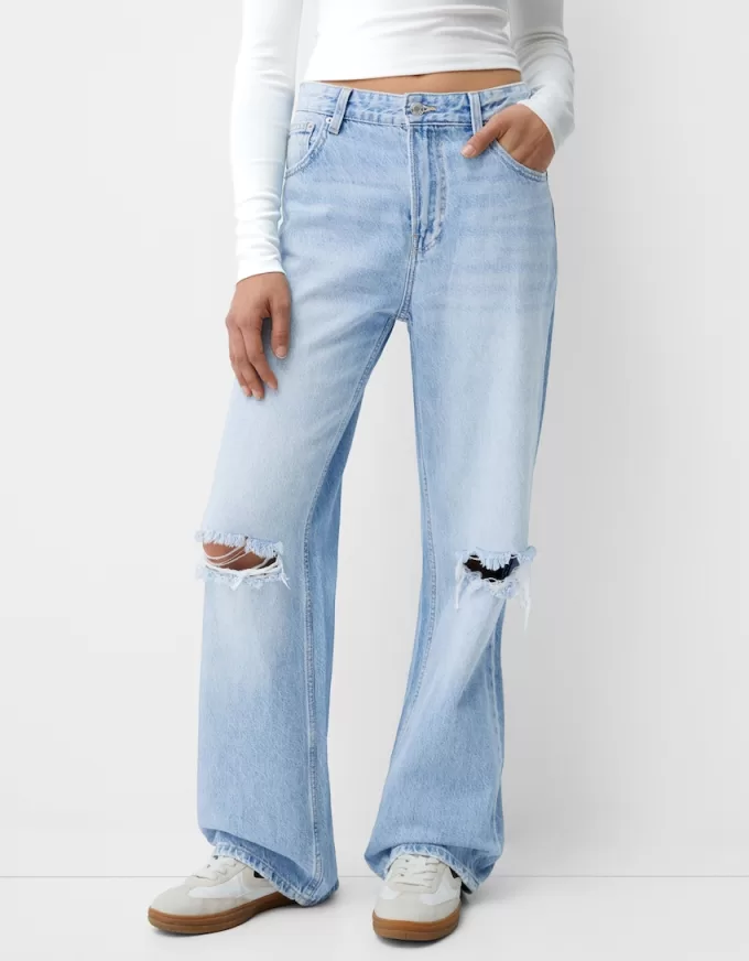 Slitna 90-talsjeans med vida ben Slitna 90-talsjeans med vida ben