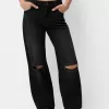Slitna 90-talsjeans med vida ben Slitna 90-talsjeans med vida ben
