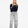 Slitna 90-talsjeans med vida ben