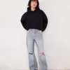 Slitna 90-talsjeans med vida ben Slitna 90-talsjeans med vida ben