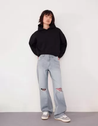 Slitna 90-talsjeans med vida ben