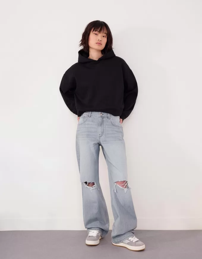 Slitna 90-talsjeans med vida ben Slitna 90-talsjeans med vida ben
