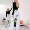 Slitna 90-talsjeans med vida ben Slitna 90-talsjeans med vida ben