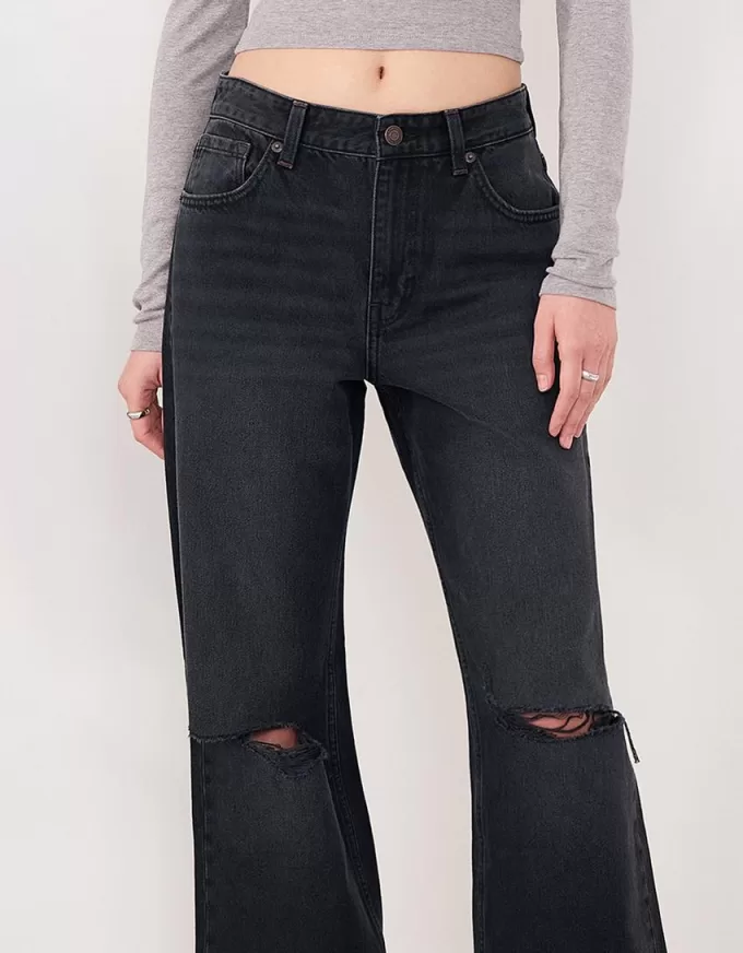 Slitna 90-talsjeans med vida ben Slitna 90-talsjeans med vida ben