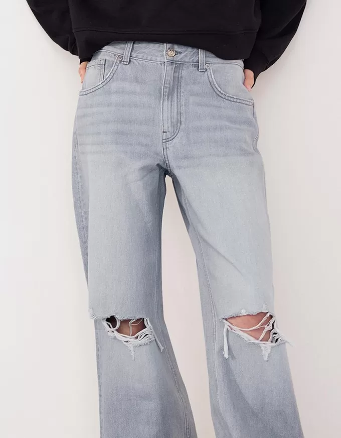Slitna 90-talsjeans med vida ben Slitna 90-talsjeans med vida ben
