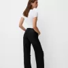 Slitna 90-talsjeans med vida ben Slitna 90-talsjeans med vida ben