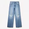 Slitna 90-talsjeans med vida ben Slitna 90-talsjeans med vida ben