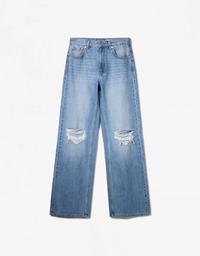 Slitna 90-talsjeans med vida ben Slitna 90-talsjeans med vida ben