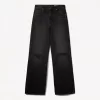 Slitna 90-talsjeans med vida ben Slitna 90-talsjeans med vida ben