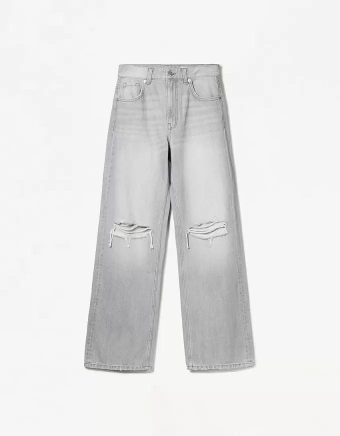 Slitna 90-talsjeans med vida ben
