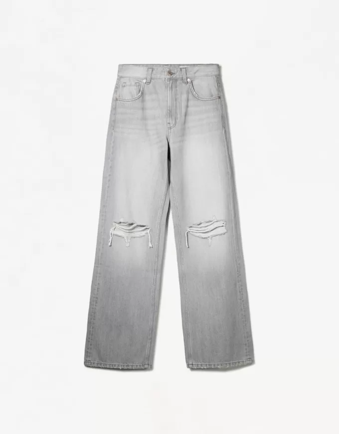 Slitna 90-talsjeans med vida ben Slitna 90-talsjeans med vida ben