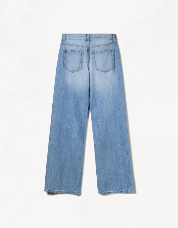 Slitna 90-talsjeans med vida ben Slitna 90-talsjeans med vida ben