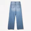 Slitna 90-talsjeans med vida ben Slitna 90-talsjeans med vida ben
