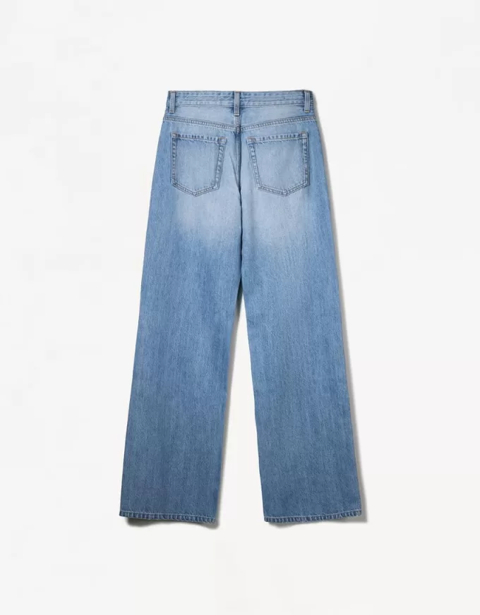Slitna 90-talsjeans med vida ben Slitna 90-talsjeans med vida ben